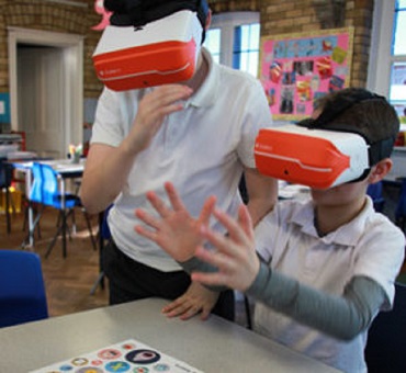 Primary School Pupils using VR Headsets