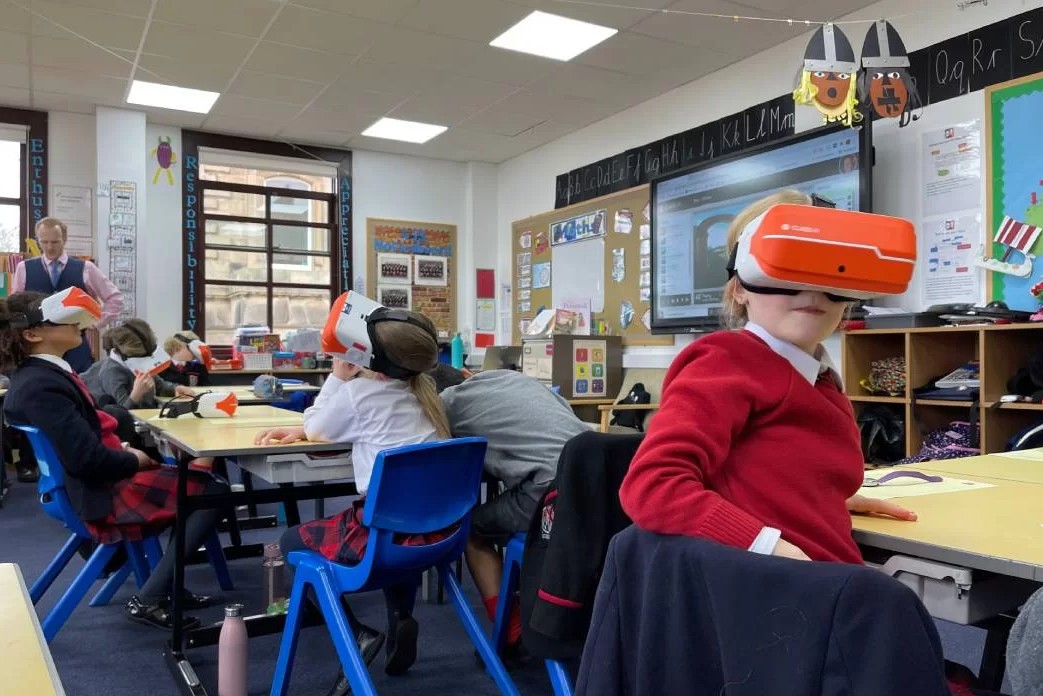 Student in a classroom enjoying the benefits of VR